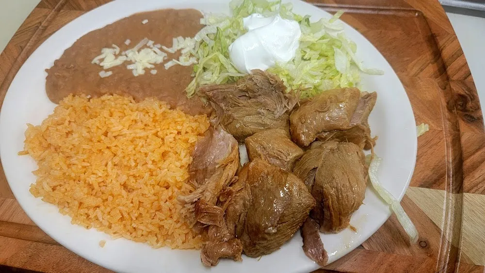 Two Tacos Mexican Rice and Refried Beans
